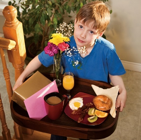 Boy with Breakfast In Bed